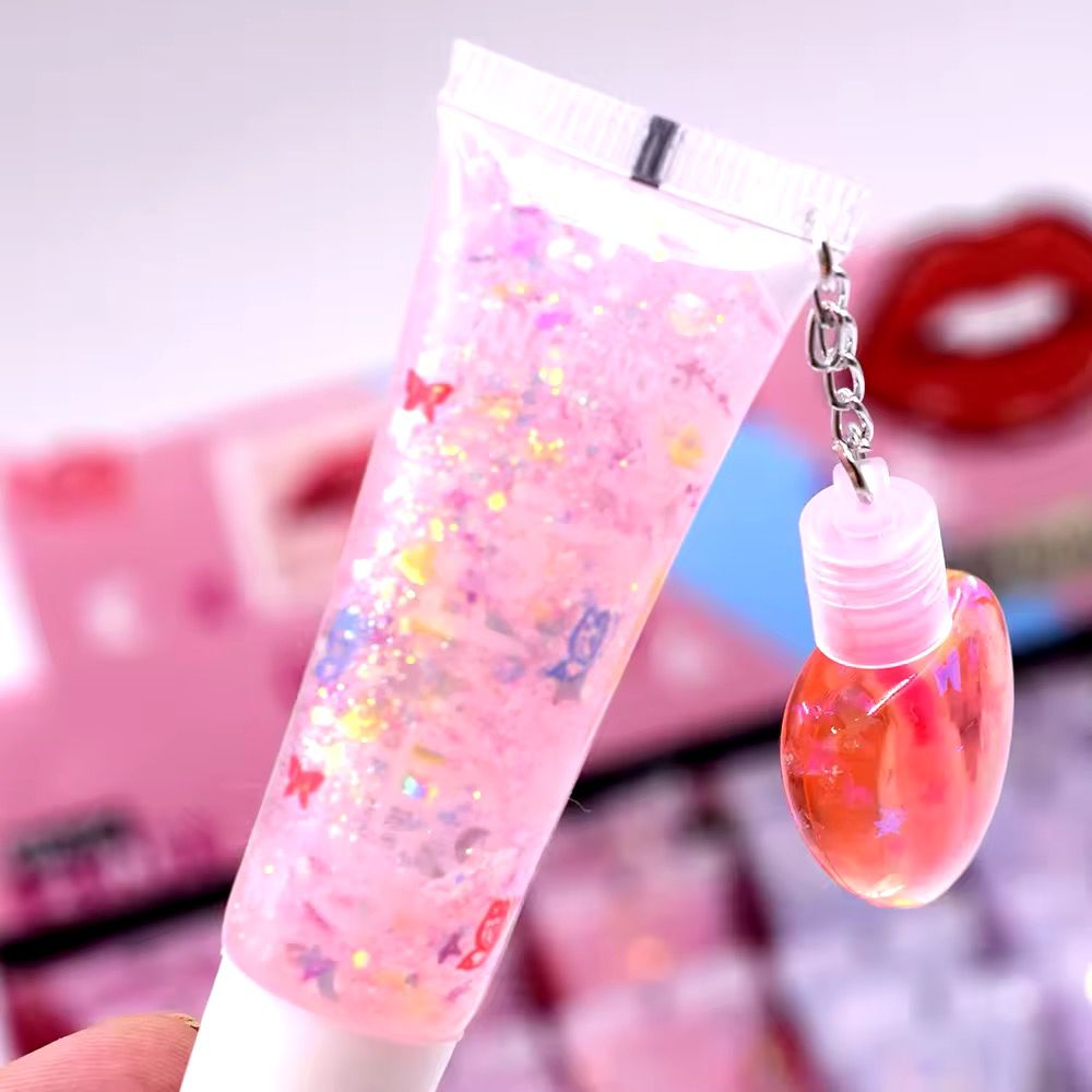 Iman Of Noble Magic 2in1 Lip Gloss & Lip Plumping Oil Each