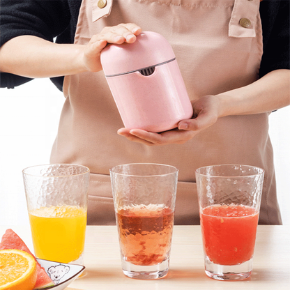 Manual Citrus Juicer with Strainer Ring and Lid 250 ml (Pink)